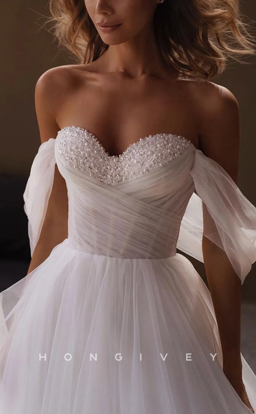 H1215 - Sexy Tulle A-Line Off-Shoulder Empire Illusion Beaded With Train Wedding Dress