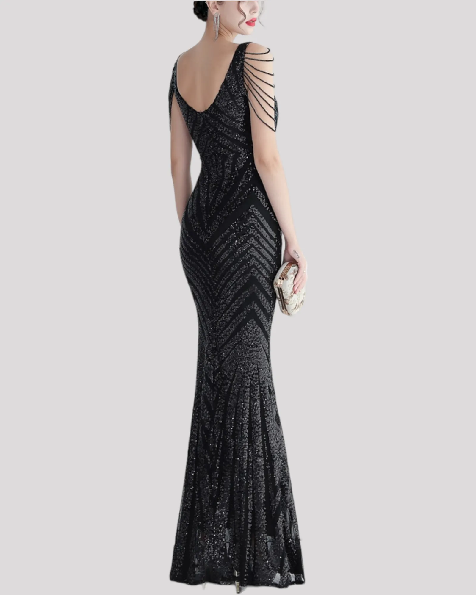 Stunning Mermaid Evening Dress with illusion cut outs and beading draping over shoulders